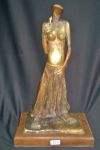 Escultura de bronze, representando Mulher com flor. Base em madeira . Assinada , JP. , 28/5/13. Alt. 50 cm ( s/base).