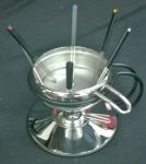 Aparelho para fondue com espetos em inox (sem uso).