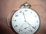 Relógio de bolso, marca OMEGA (no estado). Diâm. 4,5 cm