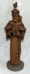 LUIZ GALDINO. Escultura de barro cozido e pintado, reproduzindo São Francisco com pombas e bíblia,altura 39 cm assinado ( pequeno defeito ).