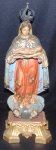 NOSSA SENHORA DA APRESENTAÇÃO. Imagem de madeira policromada com corôa. Século XIX. Alt. 35 cm