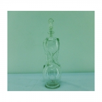 Garrafa para "glub glub" para aquavit em formato de ampulheta , em vidro soprado (apresenta manchas e pequeno bicado). Alt. 31 cm