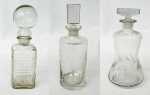 Três licoreiras de vidro e cristal, ( duas com fungos ) altura 30,28 e 26 cm