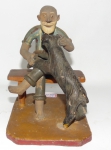 Mestre caboclo "arte popular" escultura de barro representando ancião com cachorro, ( no estado ) medindo 14 x 13 x 11 cm