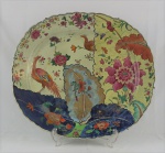 Grande travessa oval em porcelana Cia. das Indias, "serviço Folha de Tabaco", med. 42 x 46 cm (restaurada).Séc. VIII.