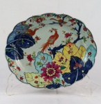 Travessa oval em porcelana Cia. das Indias, "serviço Folha de Tabaco", med. 24 x 28cm Século XVIII.