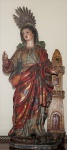 Imagem de Santa Bárbara, em madeira policromada e dourada, med.: 65 cm com o resplendor. Século XVIII.