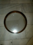 SERGIO RODRIGUES - Espelho Graselli em jacarandá. Diâm. 54 cm