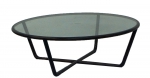 JOAQUIM TENREIRO - Conjunto de mesa de centro(alt.34 cm diâm 100 cm) e par de laterais , anos 50, em jacarandá com tampo de vidro.