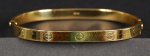 Pulseira modelo inspirado no bracelete "LOVE" da Cartier de ouro 18K, contrastado. Peso total 38.5 g