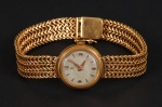 Relógio de pulso feminino em ouro amarelo 18k marca Omega, peso total 29 gr.