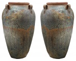 Par de antigos vasos em cerâmica moldada e vitrificada , na cor degrade em bege e verde musgo, apresenta parte superior ; próximo ao gargalo (45 cm) 4 alças. Medidas 116 x 65 cm.
