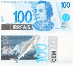Numismática / Nota - J. Bosco Renaud - Cem Irreais, sem data, papel moeda, assinada inferior direito, med. 6,5 x 14 cm.