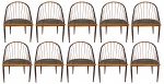 JOAQUIM TENREIRO .  Conjunto de dez cadeiras curvas em jacarandá, assento em palhinha. Anos 50.OBS (VPF)