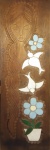 ARTE POPULAR. BATISTA. Talha em madeira  com figura feminina e pombos . Medidas 100 x 28 cm. Assinado.