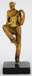 HENRIETTE GRANJA. Escultura em bronze dourado e polido, representando Músico, medindo 17 cm., sobre base em granito.