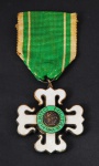 Medalha em metal esmaltado de "Mérito Militar", datada de 1934. bom estado de conservação.