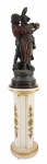 Lote contendo duas peças, sendo: escultura em bronze com figura de Casal de ciganos , assinado A.Carrier( 93 cm) e coluna em madeira patinada com aplicações em dourado ( 87 cm).