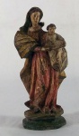 Imagem Santana Mestra caminhante em madeira com resquícios de policromia, med. 23 cm, séc. XVIII