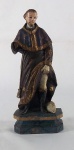 Imagem em madeira entalhada e policromada representando São Roque, med. 27 cm, Brasil séc. XVIII / XIX (falta 1 mão)