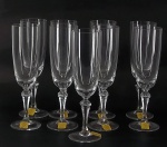 Conjunto de 9 flutes em cristal para champanhe ( sem uso ), liso da Marca STRAUSS. Alt. 19 cm.