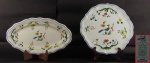 Lote com duas travessas em porcelana francesa OISEAUX DE PARADIS-GIEN, sendo 1 oval ( 36 x 21 cm) e prato redondo ( 29 cm).