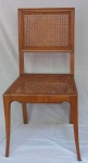 Cadeira em madeira com encosto e assento em palhinha (palhinha no estado). Medidas 88 x 44 x 41 cm.