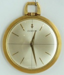 CORUM. Relógio de bolso, em ouro, medindo 40 mm. Peso total 27,4 gr.