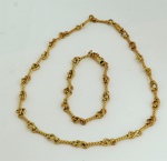 Conjunto de gargantilha e pulseira (42 cm / 20 cm) em ouro amarelo 720 ml, peso total 40,3 gr