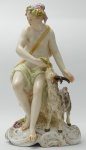 Grupo escultórico em porcelana KPM , representando figura com cabra, medindo 20 cm de altura.