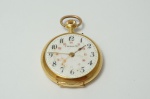 Relógio feminino de lapela em ouro amarelo 18K, 10 rubis. No estado. Peso total  17 gr