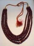 4 fios de rubi indiano medindo 42 a 48 cm cada.