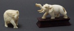 Lote de duas esculturas em marfim representando Elefantes.