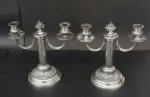 Par de candelabros para 2 velas em metal francês CHRISTOFLE, medindo 22 cm. de altura.
