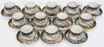 Conjunto de 12  xícaras para café com pires,  em porcelana , dita "casca de ovo", policromadas.