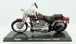 MAISTO. Harley Davidson "2001 FXSTS Springer Softail", medindo 13 cm.