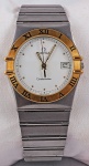 Relógio Omega "Constelation", caixa em aço com detalhes em dourado 33mm, pulseira em aço, máquina sem funcionamento.
