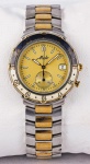 Relógio Mido, caixa 34mm e pulseira em aço com detalhes em dourado, máquina sem funcionamento.