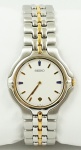 Relógio Seiko, caixa 35mm e pulseira em aço com detalhes em dourado, máquina sem funcionamento.