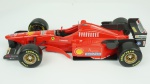 Maisto Ferrari F310, 1/20, 1996. Acondicionado em caixa de acrílico.