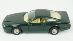 Maisto Aston Martin Virage, 1/40. Acondicionado em caixa de acrílico.