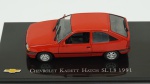 Chevrolet Kadett Hatch SL 1.8, 1991. Acondicionado em caixa de acrílico.Comprimento 10 cm.