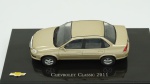 Chevrolet Classic, 2011. Acondicionado em caixa de acrílico.Comprimento 10 cm.