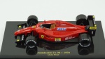 Ferrari F1-90, 1990, Alain Prost. Acondicionado em caixa de acrílico.Comprimento 10 cm.