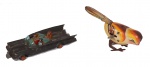 Lote c/ 2 brinquedos antigos : Bat- Móvel e passarinho. Preço de avaliação R$ 200,00