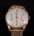 Relógio Cronograph Suisse Antimagnetic, 17 rubis, caixa 35 mm em ouro 18K e pulseira 18 K. Peso total 72,8 gr.