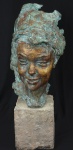 BERTHOUD (Paul-François) - Escultura em bronze representando "rosto feminino", base de mármore.Medidas escultura altura 40 cm, base altura 21 cm, altura total 61 cm.