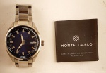 Relógio masculino, Monte Carlo Jóias, caixa e pulseira em aço, caixa com 45 mm, fundo azul, mostrador de data (marca d uso, máquina no estado não verificada)