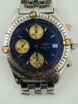 Relógio de pulso masculino, Breitling, caixa em aço com detalhes em ouro, med. 35 mm, pulseira em aço, fundo azul, marcador de data