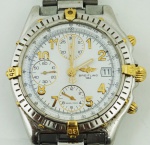 Relógio de pulso masculino, Breitling, caixa em aço com detalhes em ouro, med. 35 mm, pulseira em aço, marcador de data.